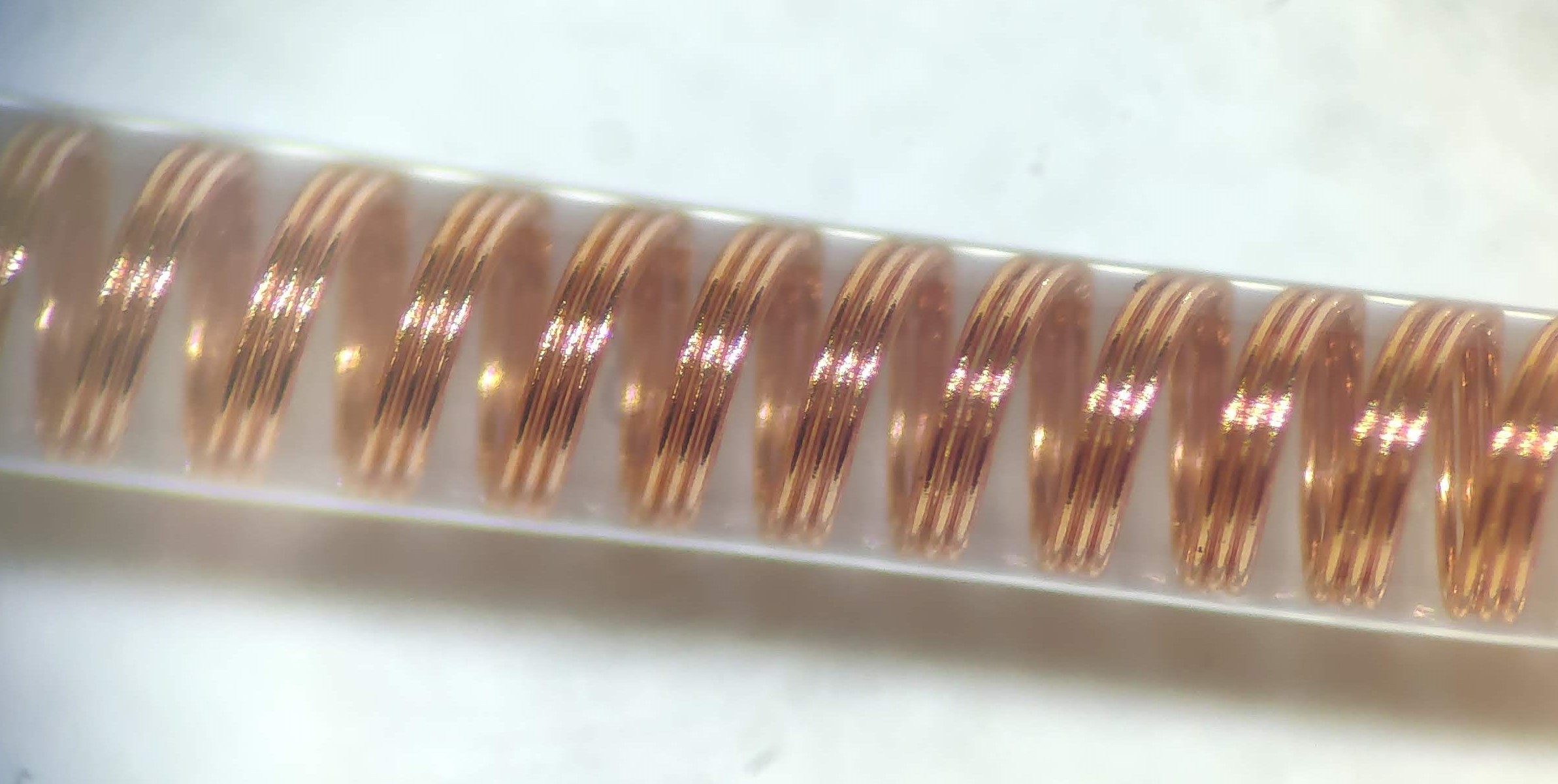 Helical coils - silicone embedded for implantable applications
